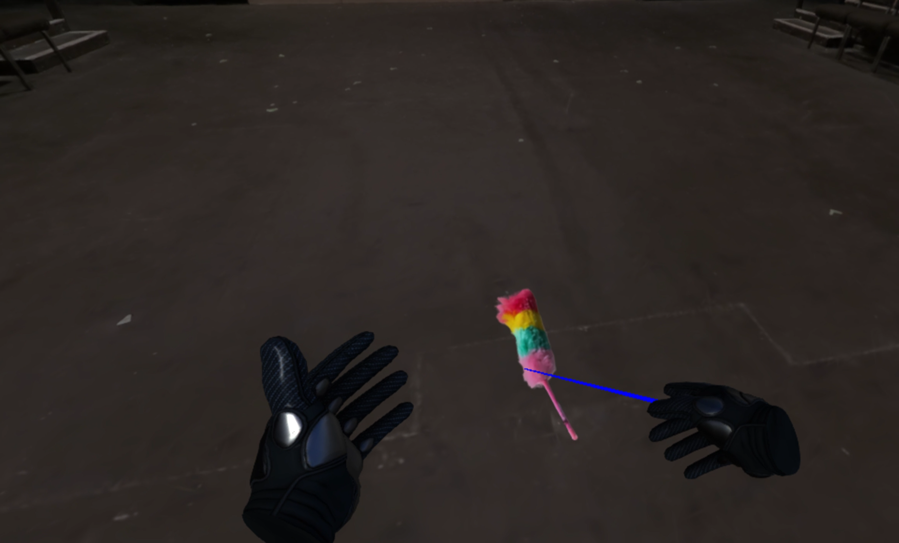 Controls teleport, walk, and point a laser to grab objects, like this feather duster.